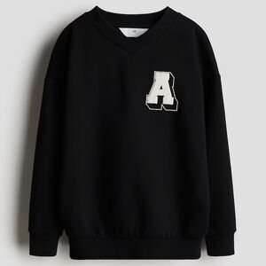H&M Black Sweatshirt with White Letter Patch